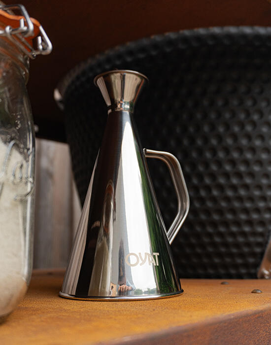 Burette à huile sur brasero